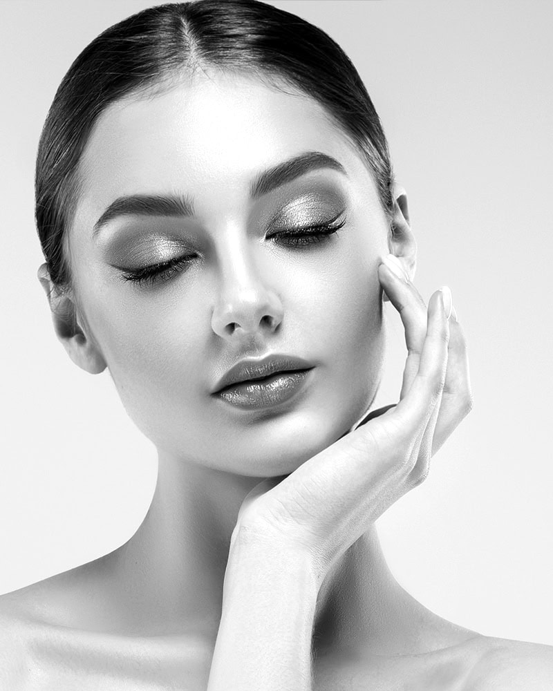 Stunning,Latina,Woman,With,Radiant,Skin,And,Soft,Makeup,Gently